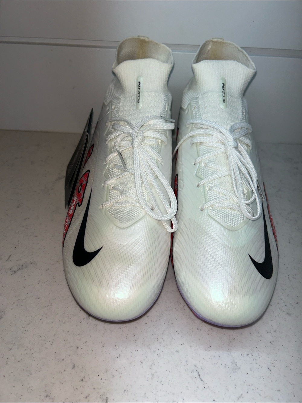 Nike White Athletic Soccer Cleats with Black Swoosh